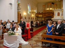 Zdjęcia w kościele podczas ceremonii ślubnej w Piasecznie